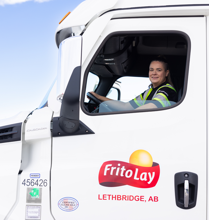 Woman driving a Frito-Lay truck